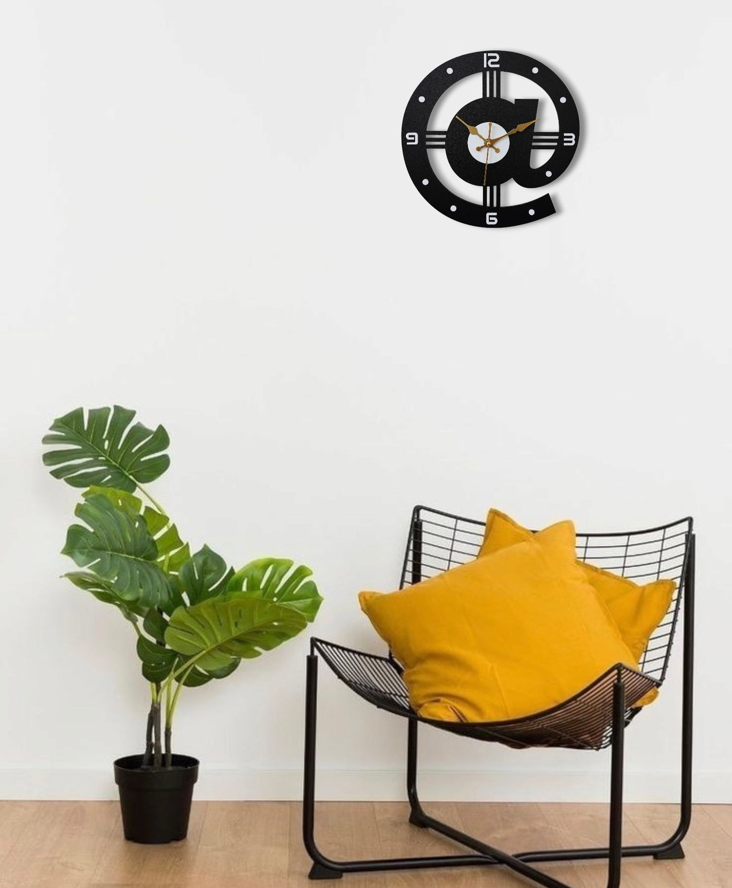Modern @ Symbol Wall Clock - Black & Gold Design